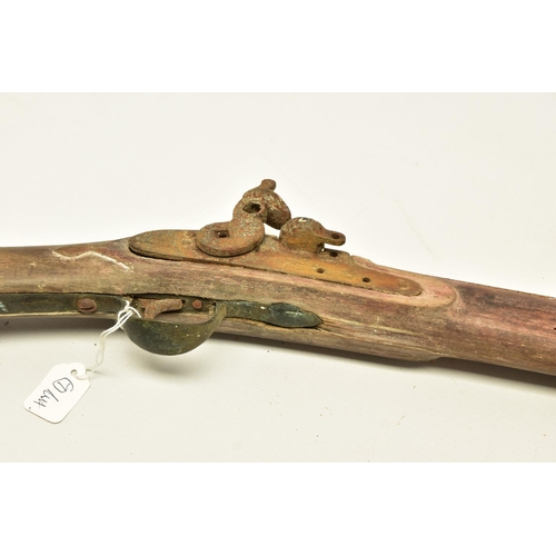 327 - AN ANTIQUE RELIC FLINTLOCK MUSKET fitted with a 51   barrel, it is missing its ramrod, top jaw and s... 