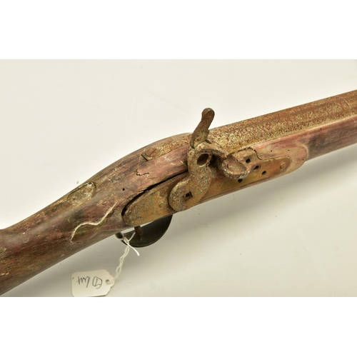 327 - AN ANTIQUE RELIC FLINTLOCK MUSKET fitted with a 51   barrel, it is missing its ramrod, top jaw and s... 