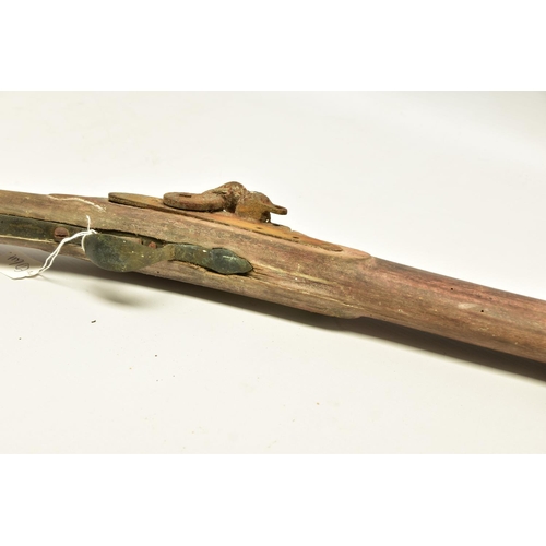 327 - AN ANTIQUE RELIC FLINTLOCK MUSKET fitted with a 51   barrel, it is missing its ramrod, top jaw and s... 