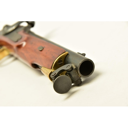 335 - AN ANTIQUE 19 BORE SINGLE BARREL PERCUSSION PISTOL fitted with a 8¼  barrel and  hinged ramrod, the ... 