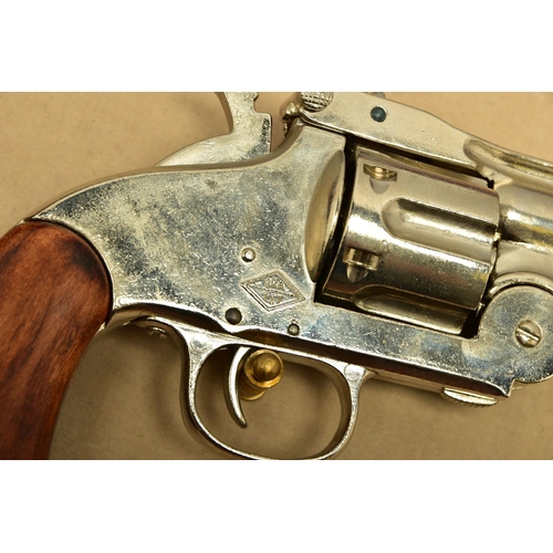 338 - A FRAMED NON FIRING WHITE METAL COPY OF A JESSE JAMES REVOLVER