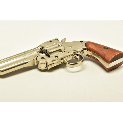 338 - A FRAMED NON FIRING WHITE METAL COPY OF A JESSE JAMES REVOLVER