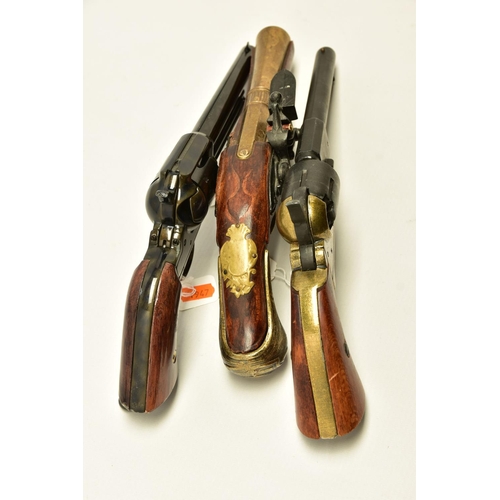 340 - THREE REPLICA PISTOLS, namely a poor quality model of a flintlock pistol, a high quality finish repl... 