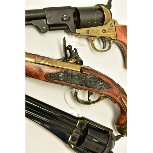 340 - THREE REPLICA PISTOLS, namely a poor quality model of a flintlock pistol, a high quality finish repl... 