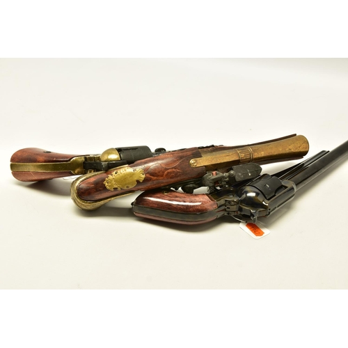 340 - THREE REPLICA PISTOLS, namely a poor quality model of a flintlock pistol, a high quality finish repl... 