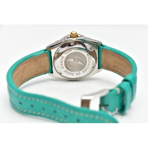 4 - A BREITLING 'WINGS' BI-COLOUR QUARTZ WRISTWATCH, the turquoise coloured dial, with gilt Arabic numer... 