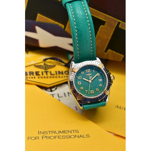 4 - A BREITLING 'WINGS' BI-COLOUR QUARTZ WRISTWATCH, the turquoise coloured dial, with gilt Arabic numer... 