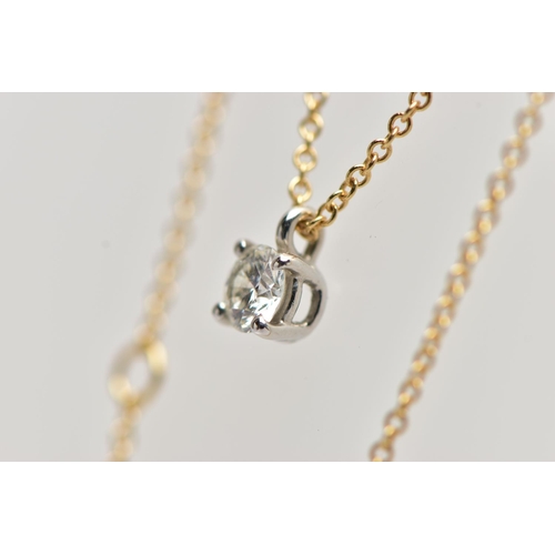 6 - AN 18CT YELLOW AND WHITE GOLD TIFFANY & CO DIAMOND PENDANT NECKLACE, set with a round brilliant cut ... 