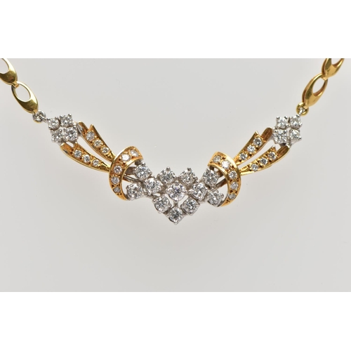 8 - A YELLOW AND WHITE METAL DIAMOND NECKLACE, the front designed as an openwork panel set throughout wi... 