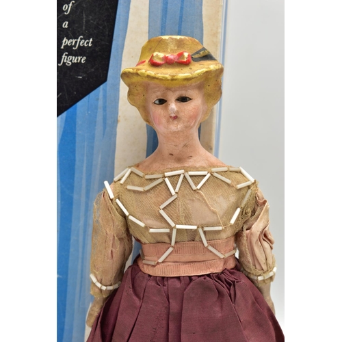 114 - A VICTORIAN WAX HEAD DOLL, the head with moulded hat and hair, inset glass eyes, wooden and cloth bo... 