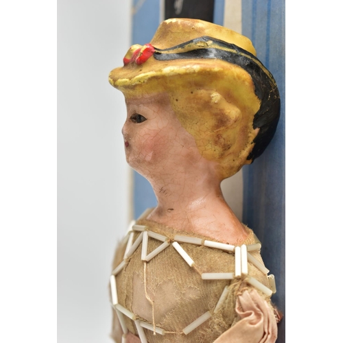 114 - A VICTORIAN WAX HEAD DOLL, the head with moulded hat and hair, inset glass eyes, wooden and cloth bo... 