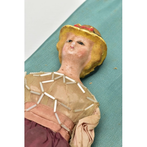 114 - A VICTORIAN WAX HEAD DOLL, the head with moulded hat and hair, inset glass eyes, wooden and cloth bo... 