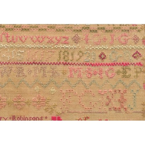 118 - A GEORGE IV NEEDLEWORK SAMPLER, the coarse linen ground worked in cottons and wool, a floral border ... 