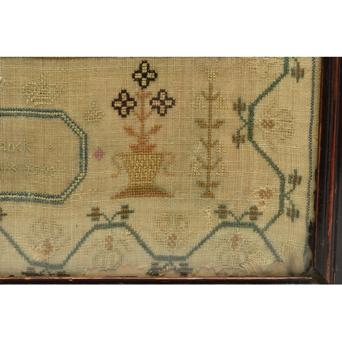 119 - A GEORGE III NEEDLEWORK SAMPLER, the linen ground worked in cottons and silks, the geometric and flo... 