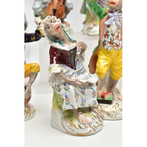 123 - A TWELVE PIECE 20TH CENTURY (POTSCHAPPEL) DRESDEN PORCELAIN MONKEY ORCHESTRA,  comprising conductor,... 