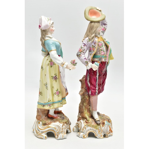 124 - A PAIR OF LATE 19TH / EARLY 20TH CENTURY CONTINENTAL PORCELAIN FIGURES OF LADY AND GENTELMAN GARDENE... 