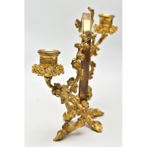 127 - A LATE 19TH /EARLY 20TH CENTURY GILT METAL TABLE TOP MIRRORED TWO BRANCH CANDELABRUM, the central ov... 