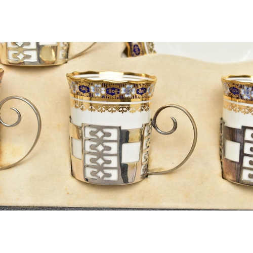 128 - A 'WALKER & HALL' CASED SET OF SIX AYNSLEY COFFEE CANS IN HALLMARKED SILVER SLEEVES AND SIX SAUCERS,... 