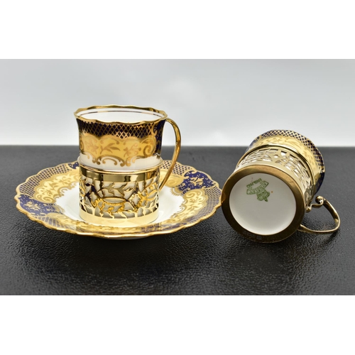 129 - A CASED SET OF SIX AYNSLEY COFFEE CANS IN SILVER GILT SLEEVES AND SIX SAUCERS, printed with a yellow... 