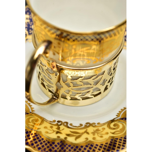 129 - A CASED SET OF SIX AYNSLEY COFFEE CANS IN SILVER GILT SLEEVES AND SIX SAUCERS, printed with a yellow... 