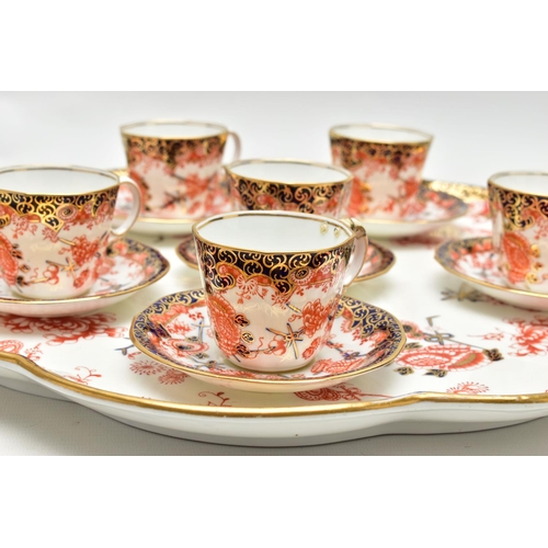 134 - A ROYAL CROWN DERBY IMARI 2469 (SCISSOR) PATTERN WAVY CIRCULAR CABARET TRAY AND SIX MATCHING COFFEE ... 