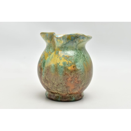 143 - PIERREFONDS - A FRENCH STUDIO POTTERY JUG, the exterior covered in green and brown crystalline glaze... 