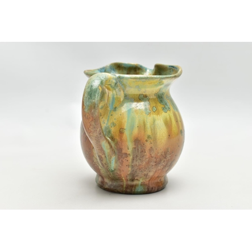 143 - PIERREFONDS - A FRENCH STUDIO POTTERY JUG, the exterior covered in green and brown crystalline glaze... 