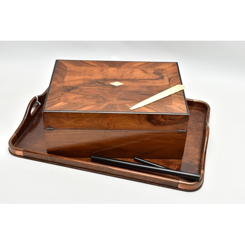 150 - AN EARLY 20TH CENTURY OAK TWIN HANDLED TRAY AND A VICTORIAN WALNUT WRITING SLOPE, the tray has four ... 