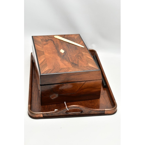 150 - AN EARLY 20TH CENTURY OAK TWIN HANDLED TRAY AND A VICTORIAN WALNUT WRITING SLOPE, the tray has four ... 