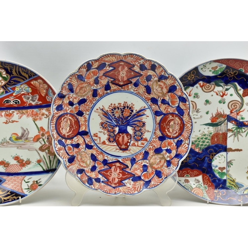 154 - THREE 19TH CENTURY JAPANESE IMARI CHARGERS, comprising a circular example decorated with a dragon, t... 