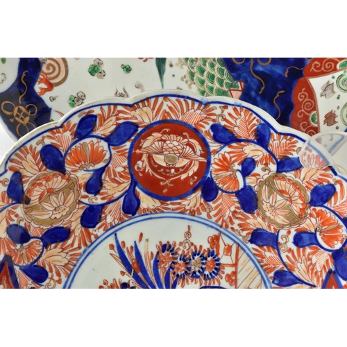 154 - THREE 19TH CENTURY JAPANESE IMARI CHARGERS, comprising a circular example decorated with a dragon, t... 