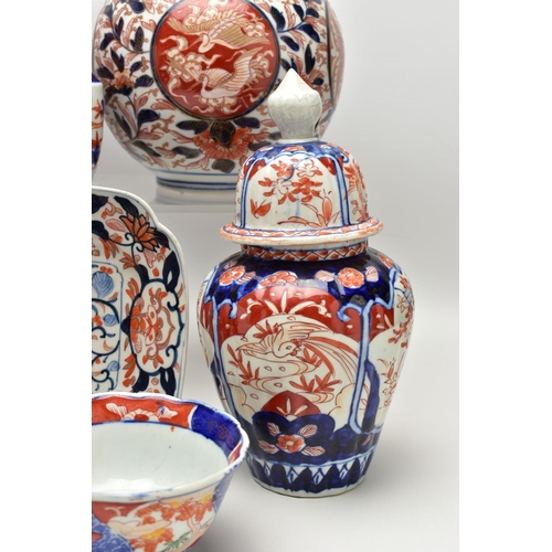 156 - A GROUP OF LATE 19TH AND EARLY 20TH CENTURY JAPANESE IMARI PORCELAIN, the majority with damage and i... 