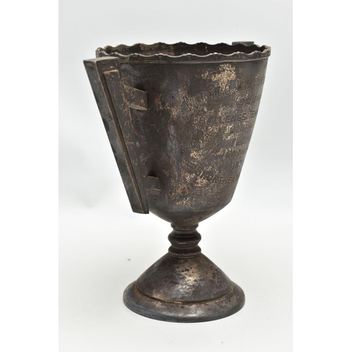 44 - A GEORGE V SILVER TWIN HANDLED TROPHY CUP, wavy rim over a conical body with angular handles, the bo... 