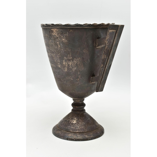 44 - A GEORGE V SILVER TWIN HANDLED TROPHY CUP, wavy rim over a conical body with angular handles, the bo... 