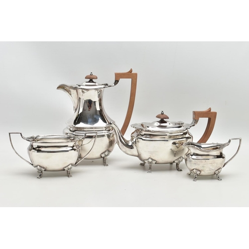 48 - A FOUR PIECE SILVER TEA SERVICE OF SHAPED OVAL FORM, comprising tea pot, hot water jug, milk jug and... 