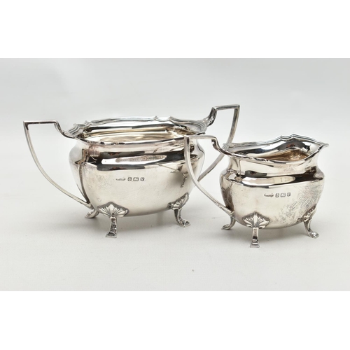 48 - A FOUR PIECE SILVER TEA SERVICE OF SHAPED OVAL FORM, comprising tea pot, hot water jug, milk jug and... 