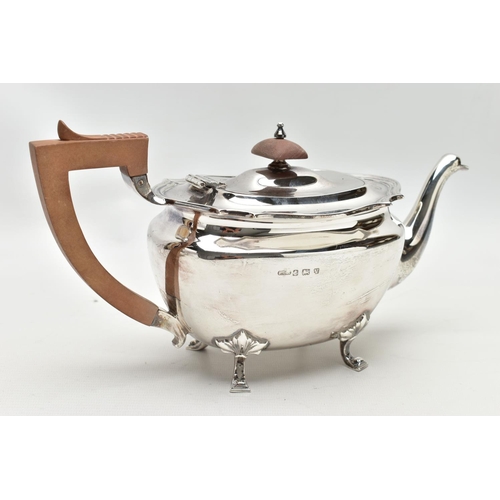 48 - A FOUR PIECE SILVER TEA SERVICE OF SHAPED OVAL FORM, comprising tea pot, hot water jug, milk jug and... 