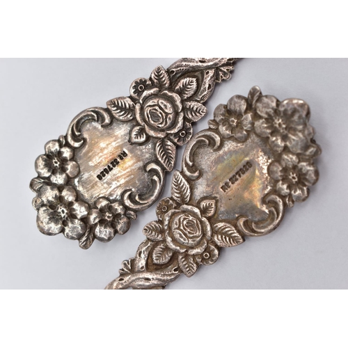 56 - A PAIR OF LATE VICTORIAN SILVER SERVING SPOONS, each with a shell shape bowl, floral and foliate dec... 