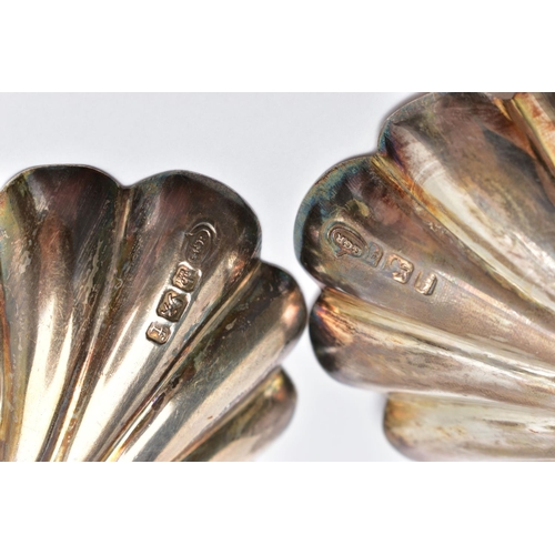 56 - A PAIR OF LATE VICTORIAN SILVER SERVING SPOONS, each with a shell shape bowl, floral and foliate dec... 