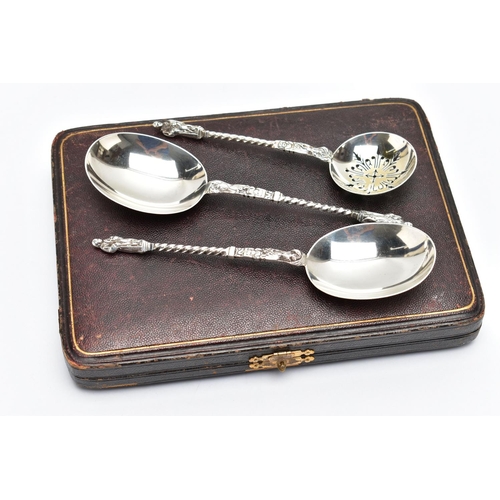 59 - A CASED SILVER SERVING SET, three silver apostle spoons to include one sifter spoon and two serving ... 