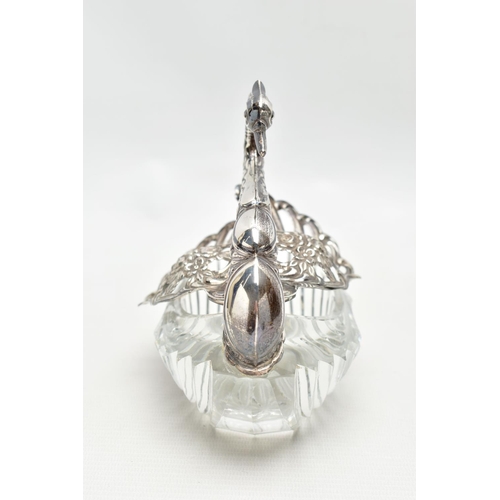 61 - A LATE 20TH CENTURY CUT GLASS AND SILVER SWAN TRINKET BOX, repousse decoration to the head and neck,... 