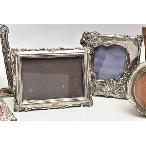 62 - SEVEN ASSORTED SILVER PHOTOGRAPH FRAMES, rectangular and circular apertures, mostly Edwardian in dat... 