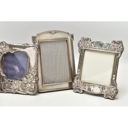 62 - SEVEN ASSORTED SILVER PHOTOGRAPH FRAMES, rectangular and circular apertures, mostly Edwardian in dat... 