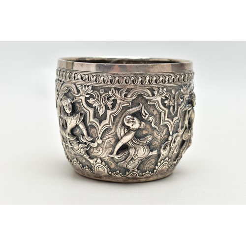 66 - A LATE 19TH / EARLY 20TH CENTURY INDIAN SILVER BOWL, the exterior cast in relief with figures dancin... 