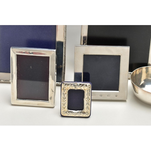 71 - TWELVE SILVER PHOTOGRAPH FRAMES AND TWO SMALL SILVER PLATED BOWLS, all of the photograph frames are ... 