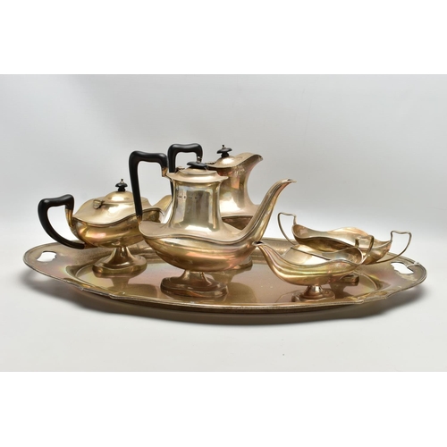 73 - A GEORGE V SILVER FIVE PIECE TEA SET ON OVAL TWIN HANDLED TRAY, the set of oval / Aladdin's lamp sty... 