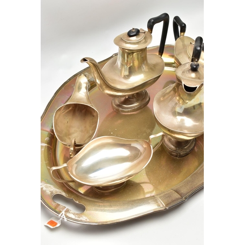 73 - A GEORGE V SILVER FIVE PIECE TEA SET ON OVAL TWIN HANDLED TRAY, the set of oval / Aladdin's lamp sty... 