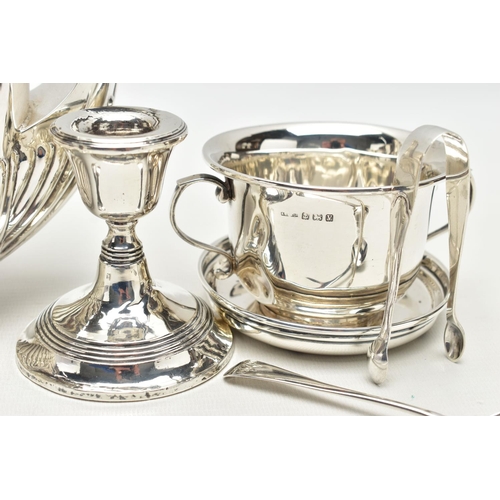 80 - A GEORGE V SILVER TEA POT OF OVAL FORM, domed cover with reeded detail, ebonised fitments, the lower... 