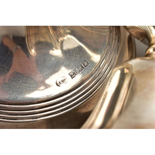 81 - A PAIR OF ELIZABETH II FILLED SILVER CANDLESTICKS, concentric reeded band decoration to the top rim,... 