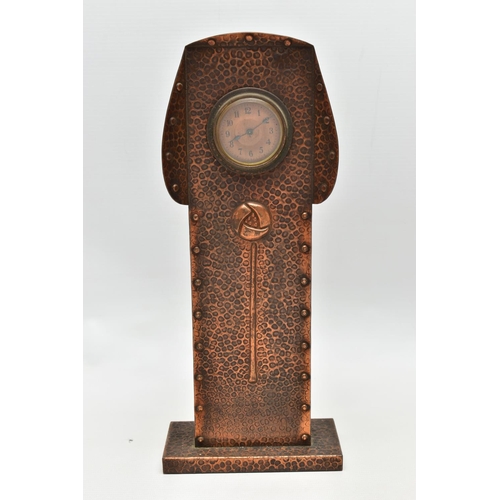 158 - AN ARTS AND CRATFS COPPER MANTEL CLOCK, the shaped rectangular case embossed with planished style fi... 